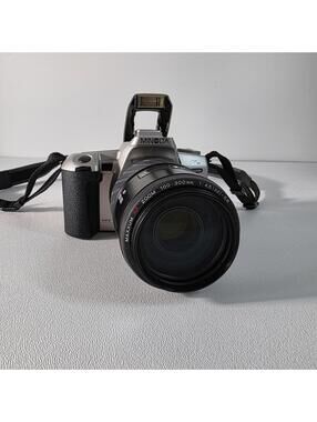 Minolta STsi Maxxum Camera with AF 100-300mm Zoom Lens And Strap